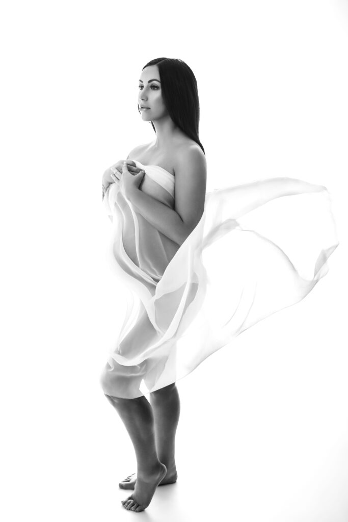 Ethereal Vogue-inspired maternity portrait in Oklahoma City, sheer fabric and all-white style