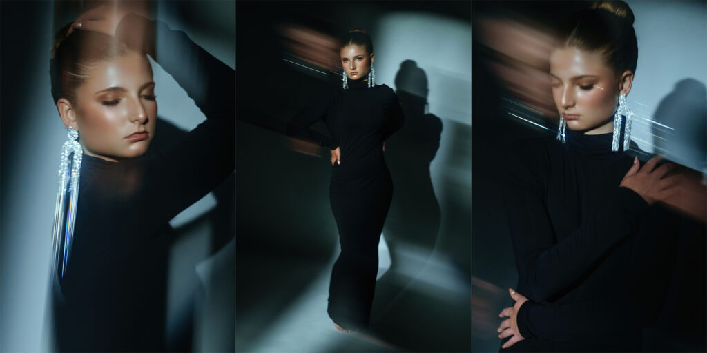 Editorial portrait photography featuring a woman in a black dress with dramatic creative lighting and artistic motion effects during a luxury portrait session in Oklahoma City.